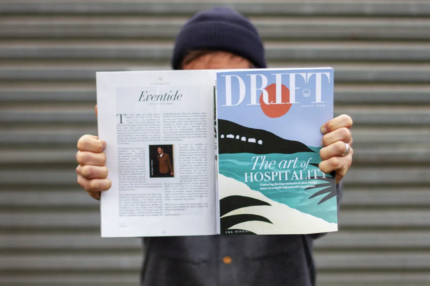 mat arney holding up a copy of drift magazine featuring his op-ed piece